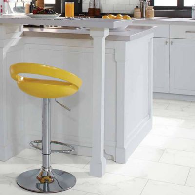 oversized floor tiles in a bright kitchen